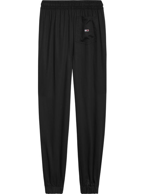 JOGGERS AMPLIOS CON INSCRIPCIÓN DE TOMMY JEANS
