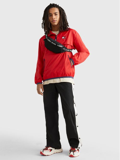 RIÑONERA CON INSCRIPCIÓN ESSENTIAL