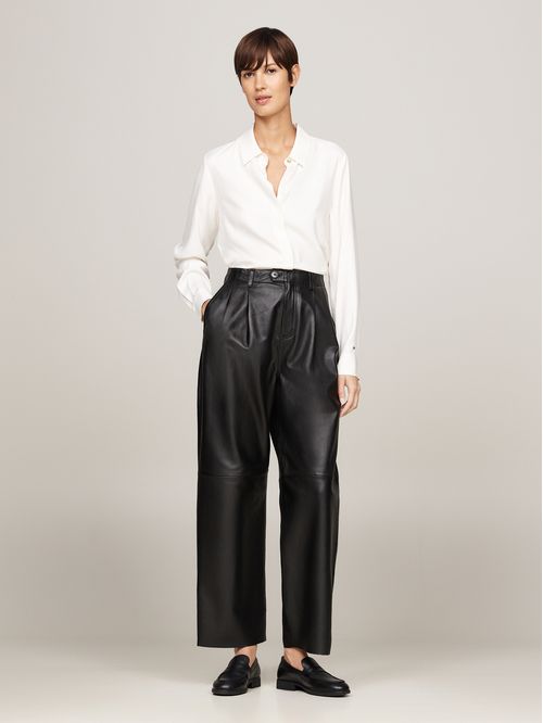 Camisa de corte amplio con logo metálico